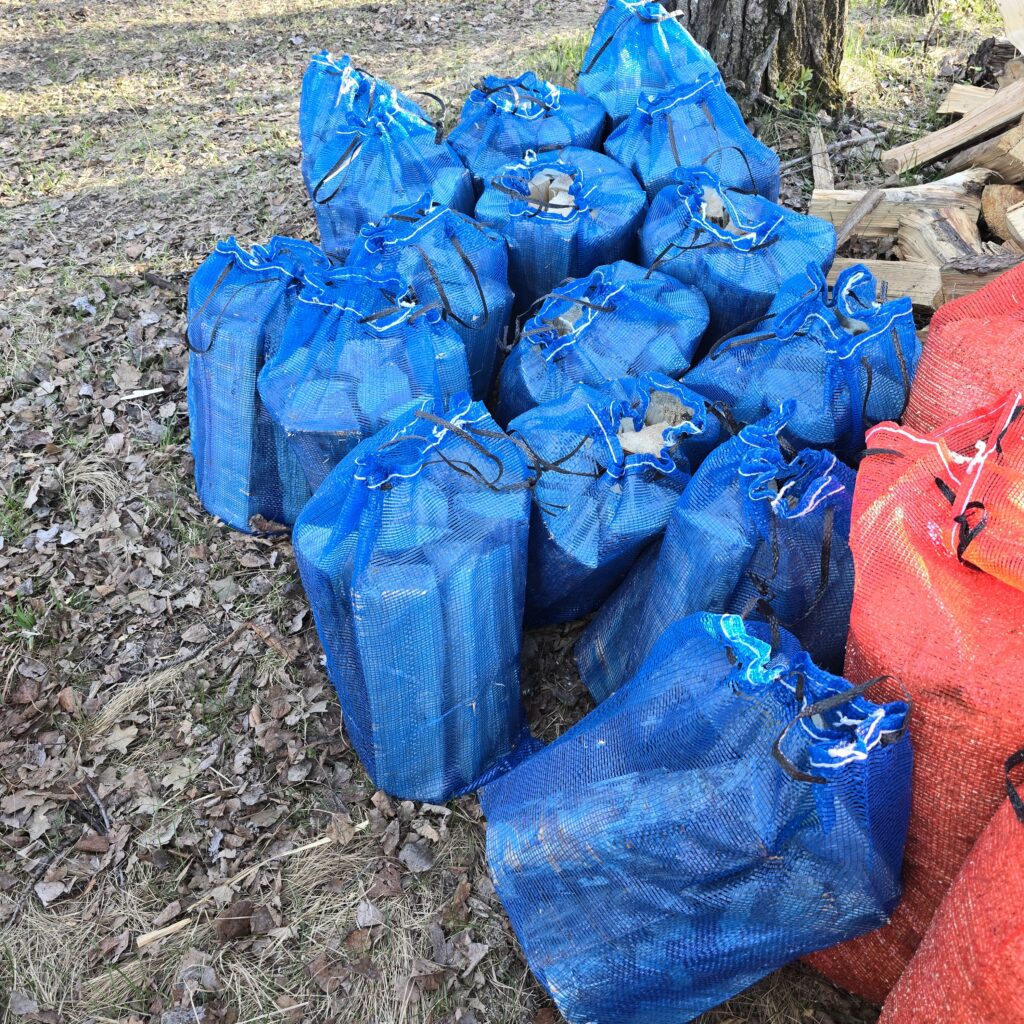 Mesh bags filled with wood