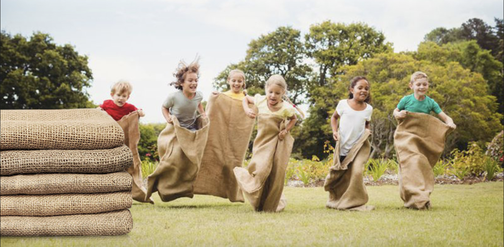 Kids participating in a sack race