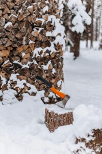 Firewood covered in snow